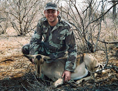 Cobus with Impala Ewe at Zulani